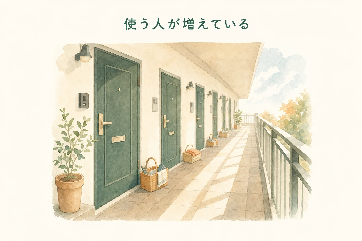 集合住宅の廊下に並ぶ玄関ドアと、いくつかのドアの前に置かれた小さな道具かごのアイキャッチ